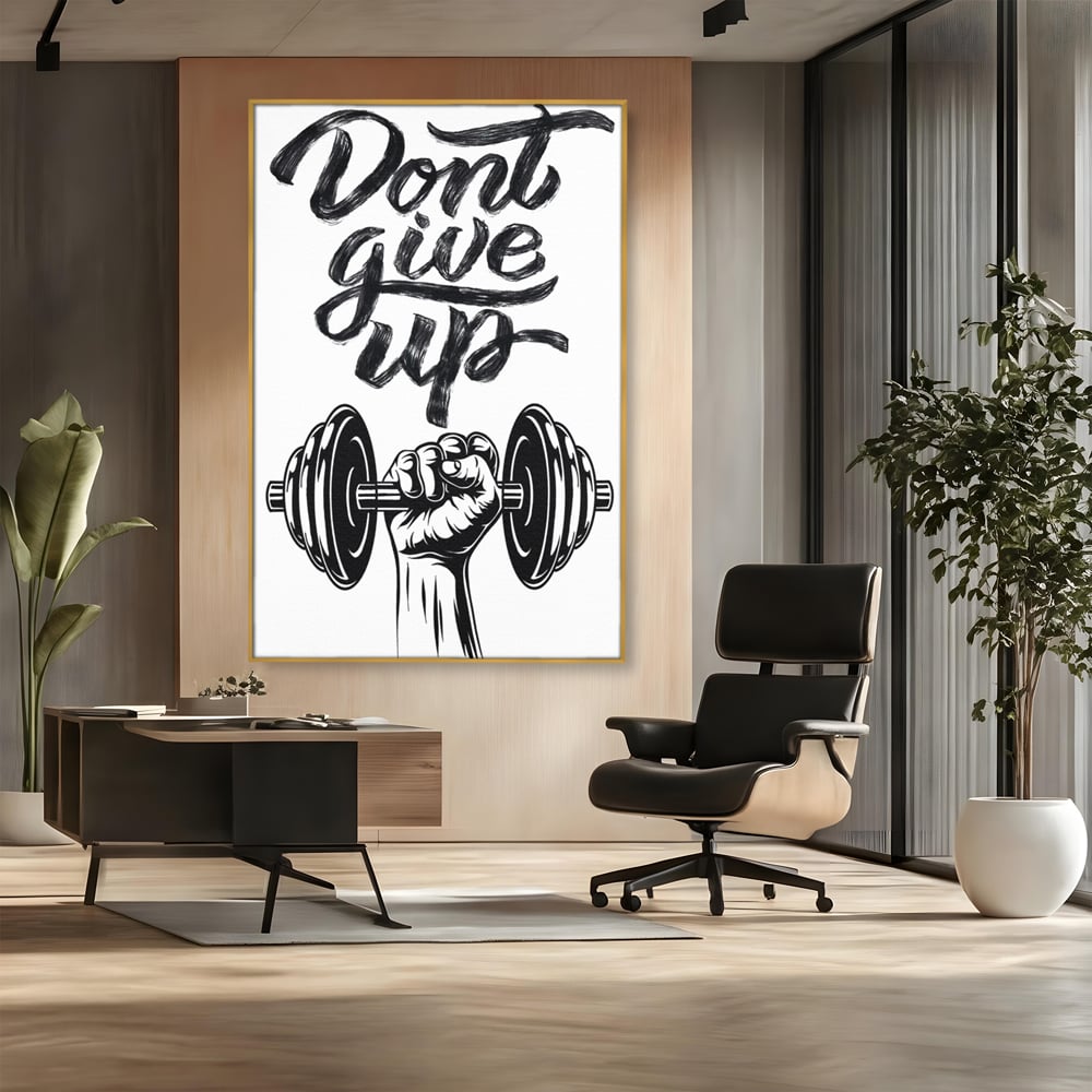 Tablou canvas cu ilustratie motivationala cu halterofil si mesaj, in rama de aluminiu auriu, pe perete intr-un birou